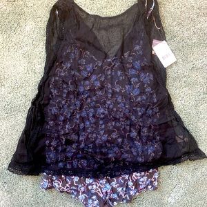 Romper with black mesh like overlay